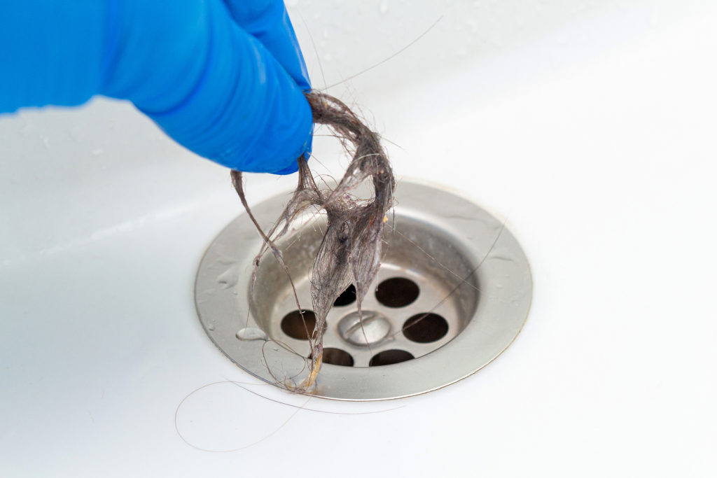 How to Remove Hair Clogs from a Drain - AG Hardware